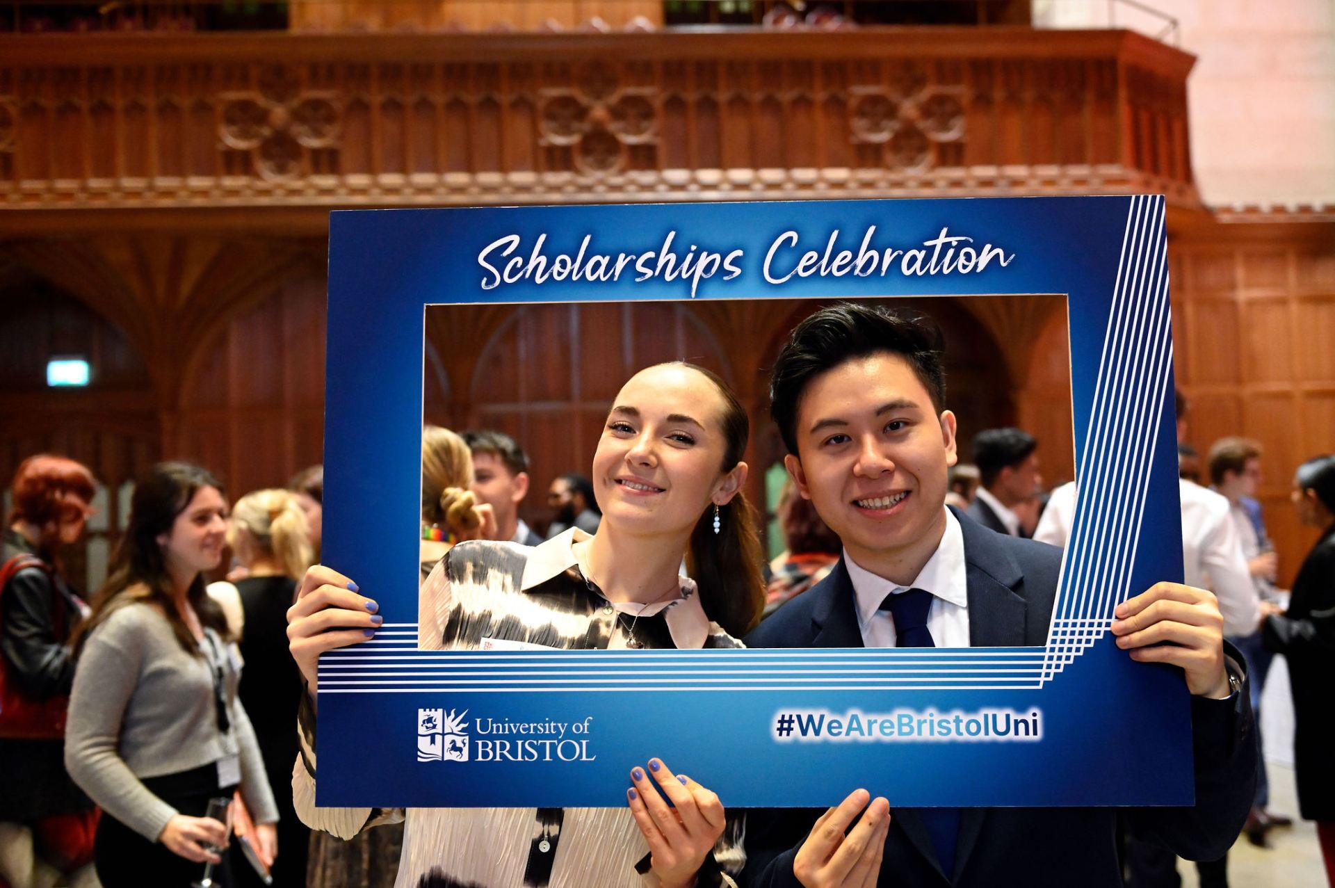 Rose and Ryan pose in a Scholarship Celebration frame at the event.